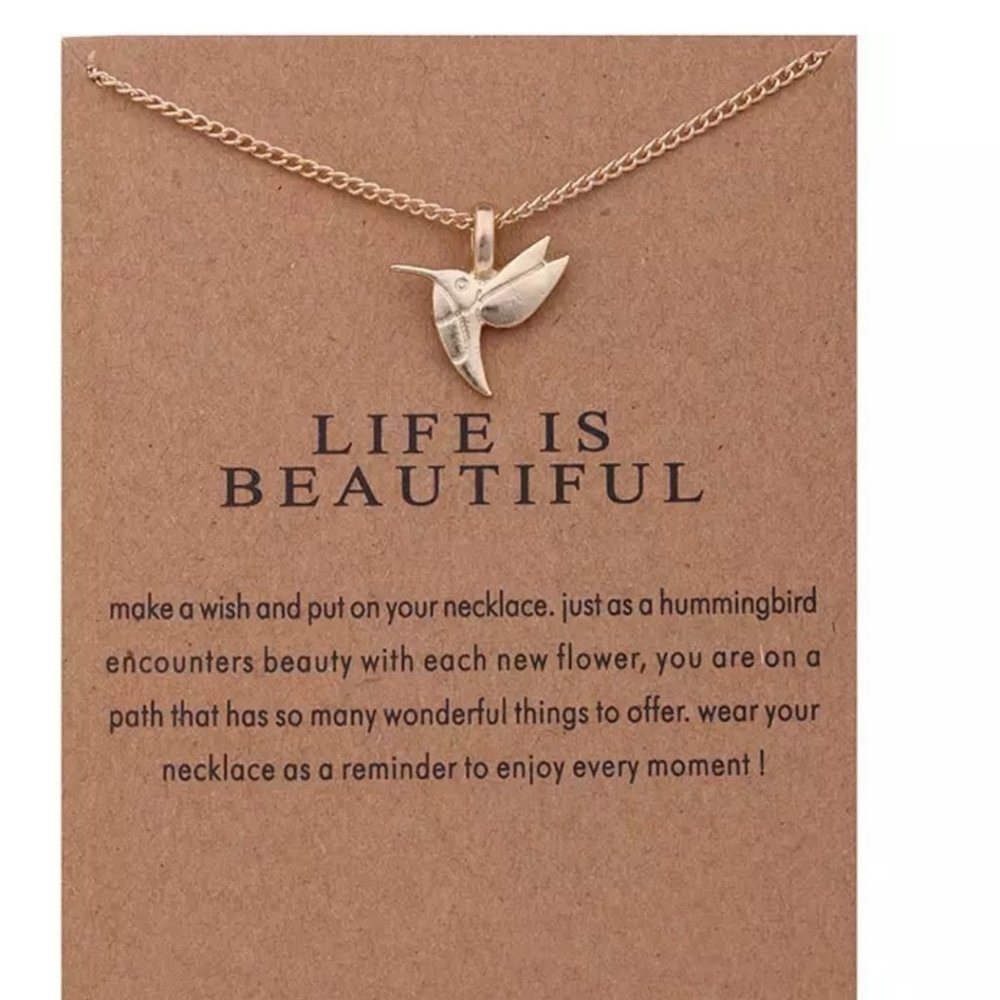 Humming bird gold necklace